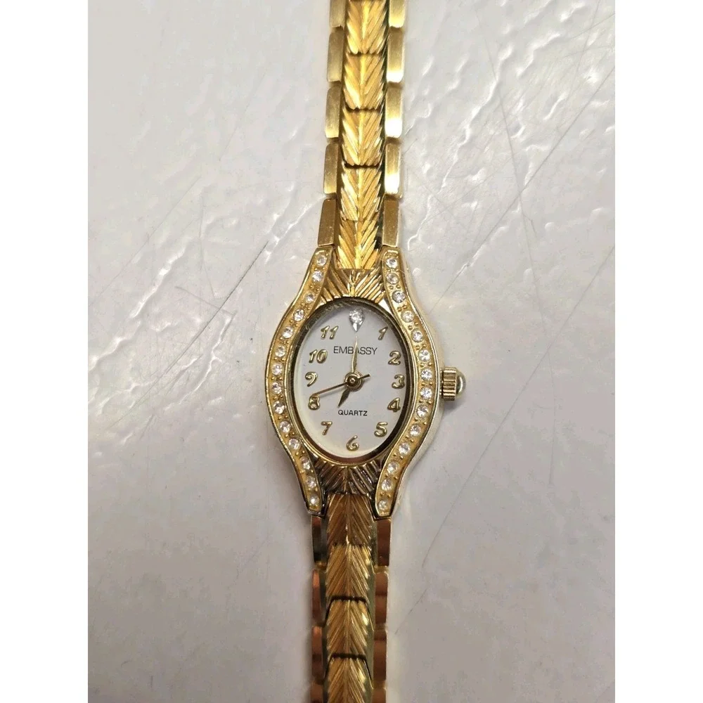 Embassy Womens Watch Gold Tone Rhinestone Bezel Small Chevron Link Bracelet